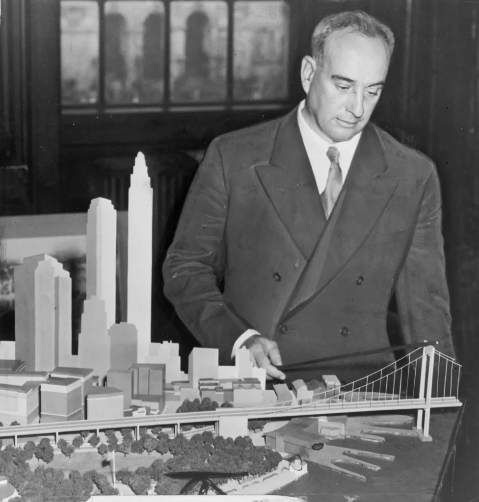 Robert Moses ( December 18 1888–July 29 1981) was the "master builder" of mid-20th century New York City, Long Island, and other suburbs. As the shaper of a modern city, he is sometimes compared to Baron Haussmann of Second Empire Paris, and he was easily the most polarizing figure in the history of urban planning in the United States. Although he never held elected office, Moses was arguably the most powerful person in New York City government from the 1930s to the 1950s. He literally changed shorelines, built roadways in the sky, and transformed vibrant neighborhoods forever. His decisions favoring highways over public transport formed the modern suburbs of Long Island and influenced a generation of engineers, architects, and urban planners who spread his philosophies across the nation.