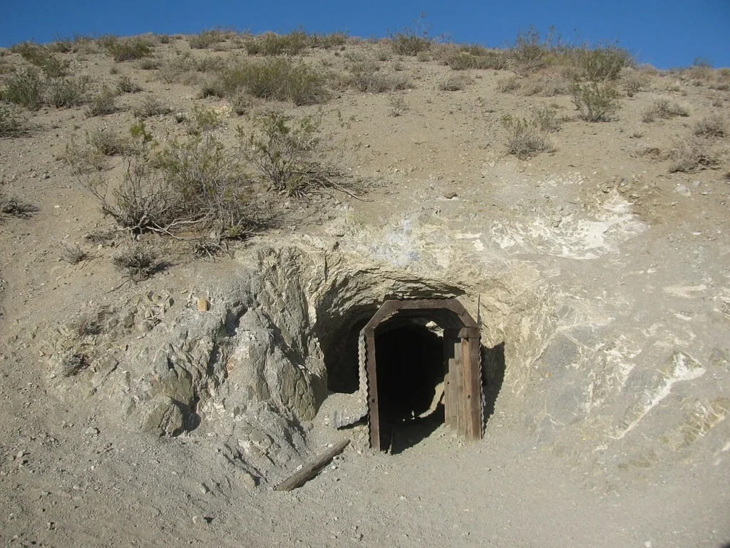 South entrance of Burro Schmidt Tunnel in a barren California hillside, featured in The Beauty Is in the Attempt.